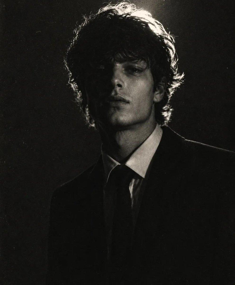 B&W Suit Low-Key Portrait Prompt — Cinematic Film Grain Studio Shot — AI image generated with GPT Image 2